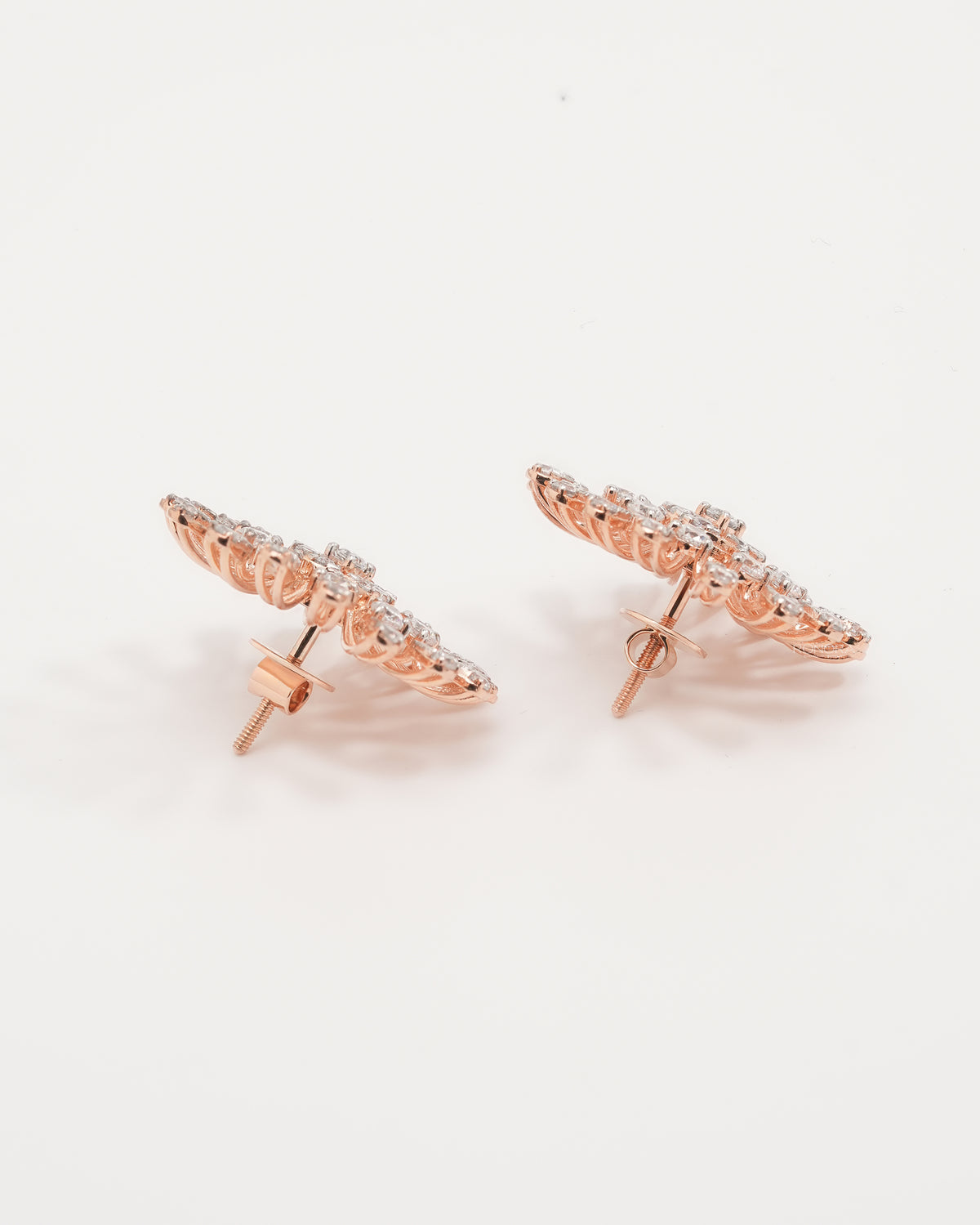 Starburst cluster lab grown diamond earrings in rose gold, side view with screw back posts