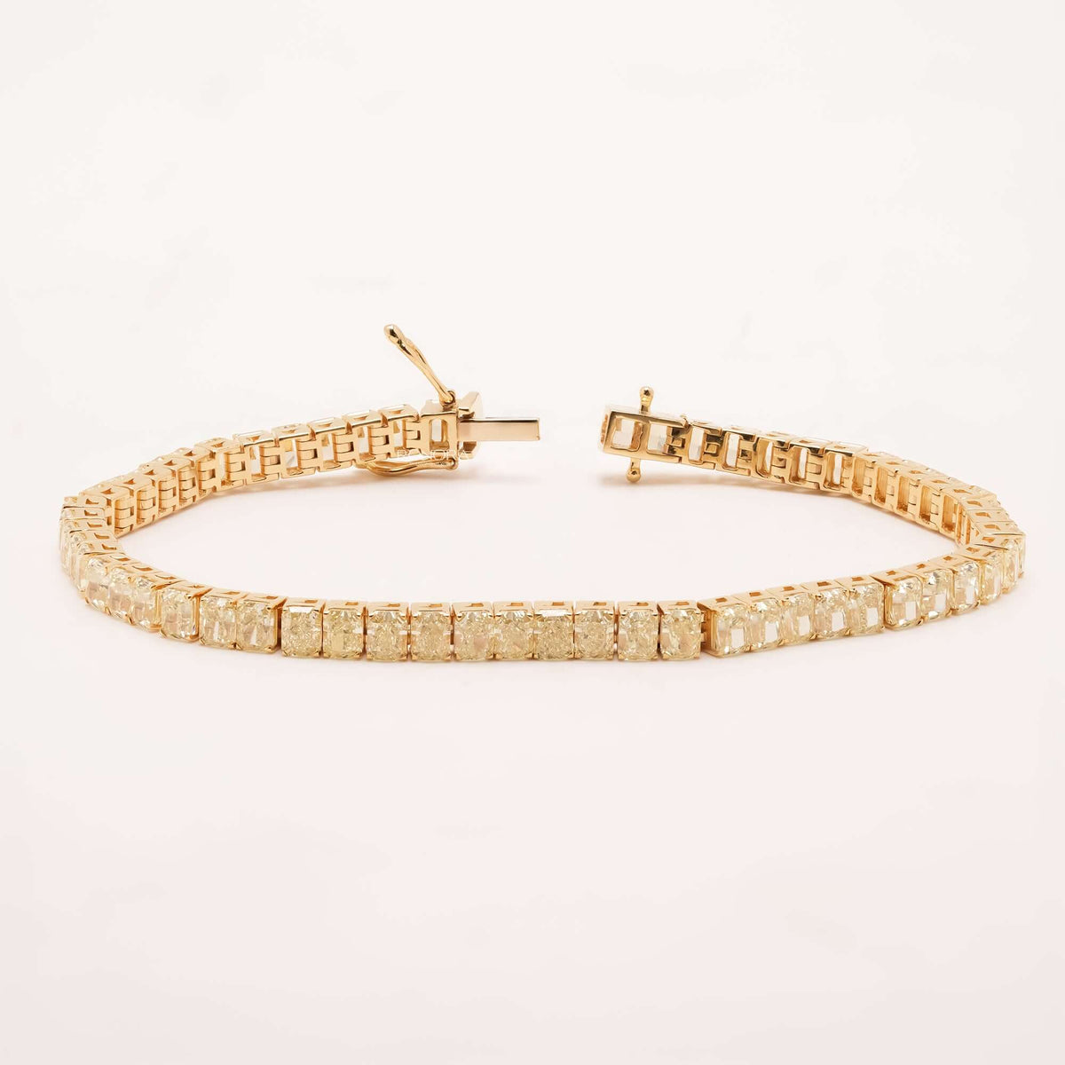 Open radiant yellow lab grown diamond tennis bracelet with clasp
