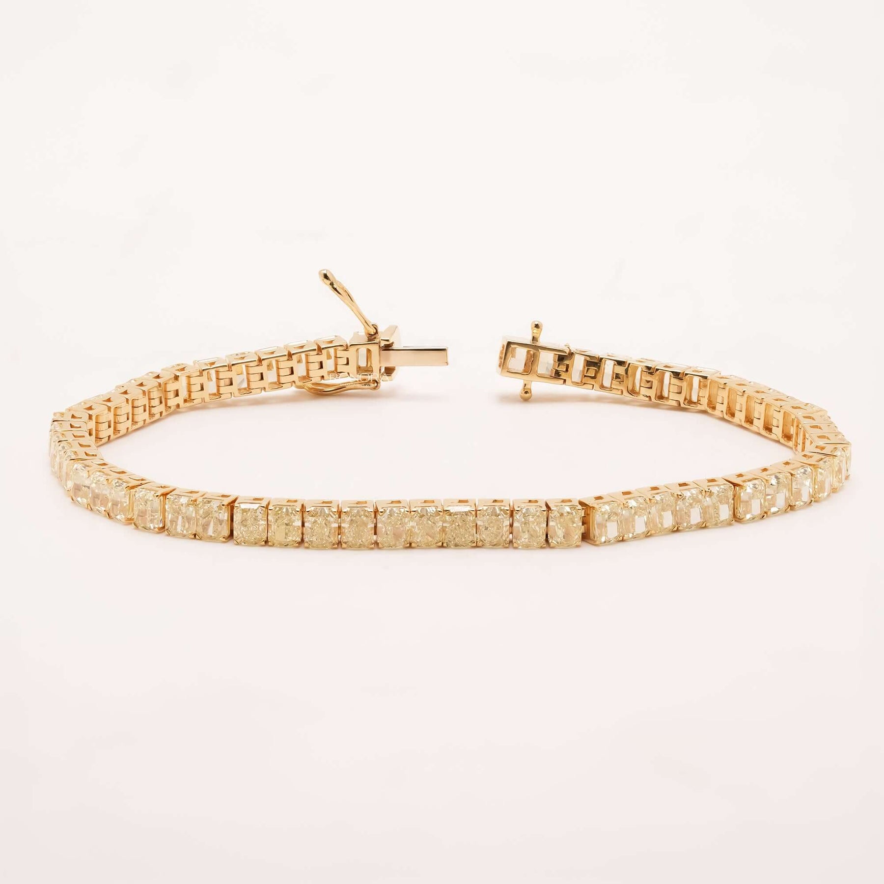 Open radiant yellow lab grown diamond tennis bracelet with clasp