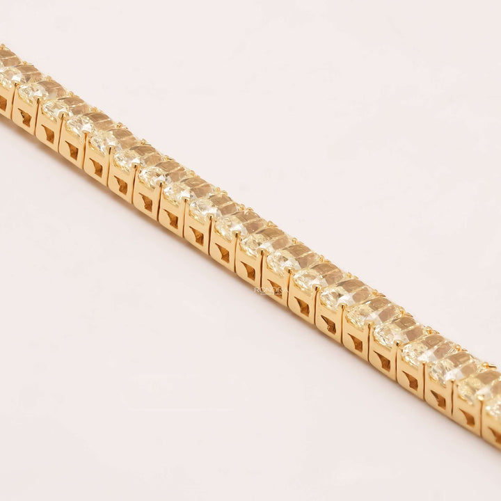 Side detail of radiant yellow lab grown diamond tennis bracelet