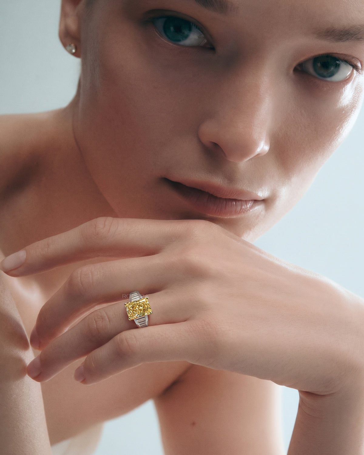 Model wearing the fancy yellow radiant lab grown diamond ring